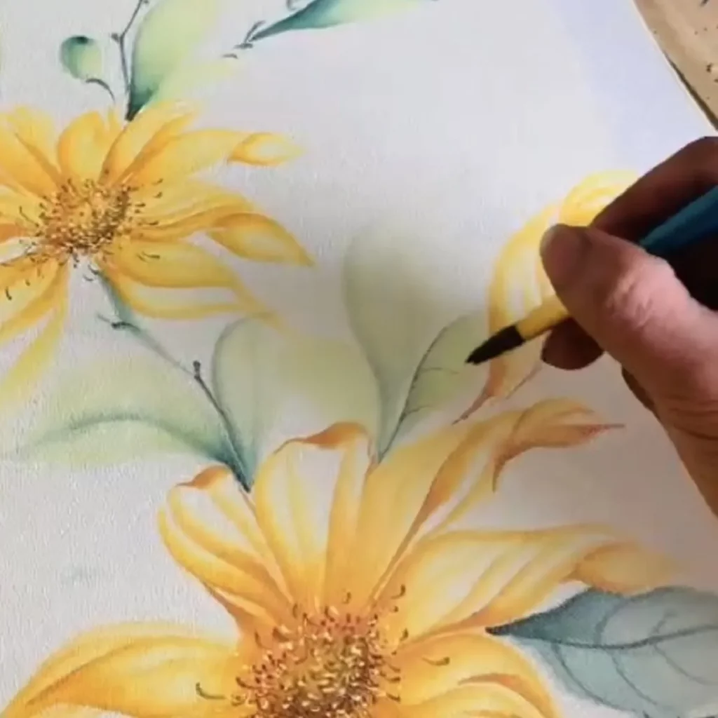 Nghệ nhân SenSilk vẽ tay hoàn thiện họa tiết trên lụa thủy ấn