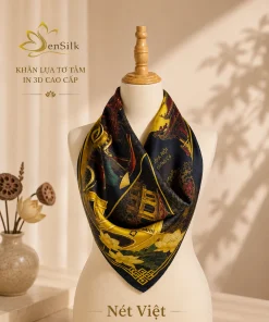Khăn lụa Nét Việt trải trên mannequin, nổi bật họa tiết hoa sen, cầu và xe xích lô